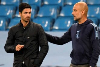 Arsenal coach says title race isn't over for Man City