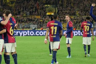 Barcelona advance to semis after loss at Dortmund