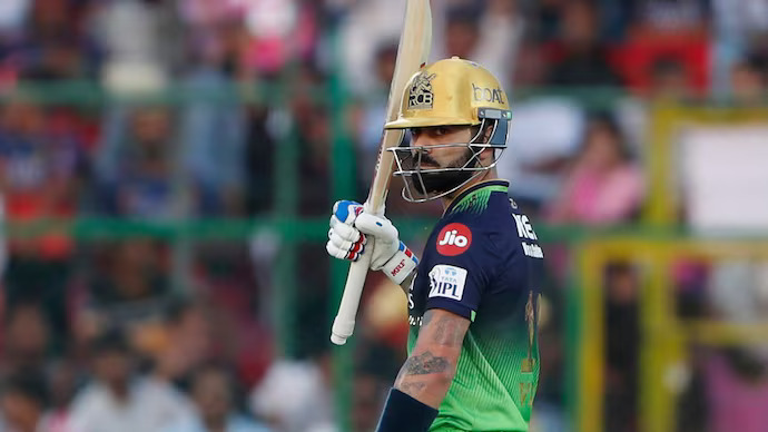 Kohli reaches 100 fifties in style