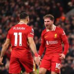 Liverpool edge closer to title with gritty win