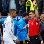 Real Madrid battle to win after Mbappé red card