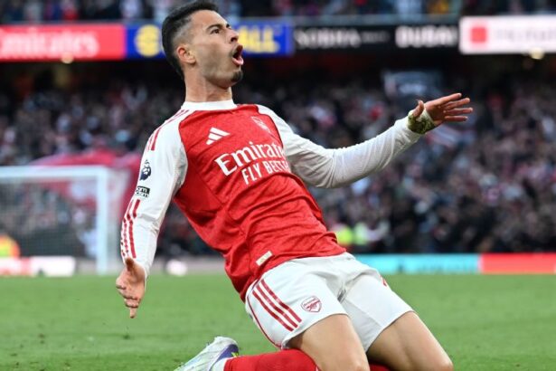 Arsenal fight back to draw Man City with Martinelli goal