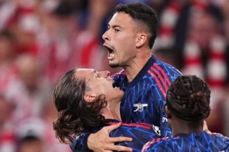 Two substitutes seal victory as Arsenal kick off season