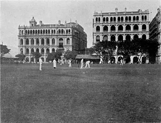 HKCC changed playing locations (1 of 2), Photo shows the Hong Kong Cricket Club in Central, Hong Kong in the 1900s. The site is now open to the public and occupied by Chater Garden, a park open to the public.