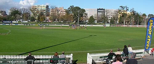 A VAFA match featuring Old Melburnians at the Junction Oval looking towards Fitzroy Street from the hill on the outer