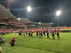 Western Sydney Wanderers celebrating after winning an A-League game