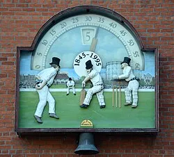 The clock by the Members' entrance to the pavilion