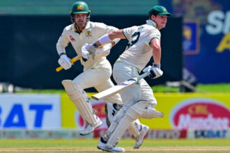 Smith and Carey's centuries lead Australia